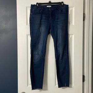 Ankle cut skinny jeans. Size 8/29. Deep blue. Slightly frayed cuff.